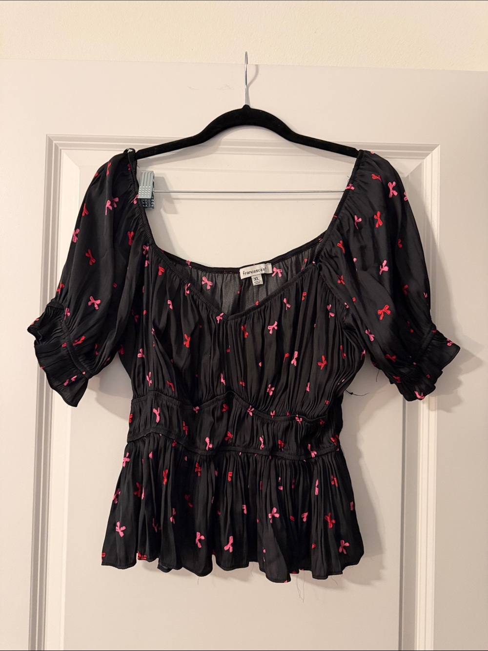 Francesca's Collections Black Blouse with Pink Bow Print
